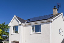 Ireland, County Sligo, Carney, Suburban house with solar panels on roof.