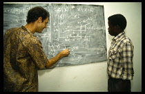 Ghana, General, VSO maths teacher and pupil.