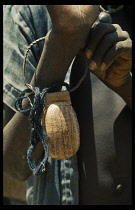 NIger, General, Detail of Tuareg gri gri charm or talisman worn around wrist.