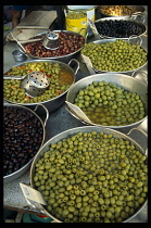 Spain, Balearic Islands, Majorca, Pollenca.  Olives for sale on market stall.