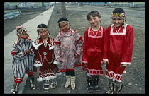 Russia, Kamchatka, Achai Vayam, Chukchis and Russian children in costume at Spring Festival.