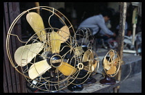 Vietnam, North, Hanoi, Old fashioned metal fans for sale.