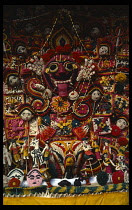Indonesia, Bali, Eka Dasa Rindra, Elaborate  coloured rice pastry figures and flowers given as offerings.