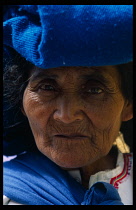 Mexico, Chiapas, San Cristobal de las Casas, Head and shoulders portrait of elderly Tzotzil Indian woman in traditional dress.