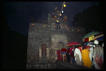 Ethiopia, Gonder, Timket festival or Feast of the Epiphany with priests entering Fasils pool.