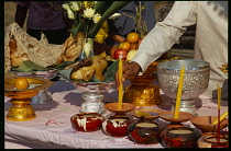 Cambodia, Siem Reap, Angkor Wat, Shaman ceremony preparing the altar with offerings of food.