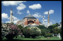Turkey, Istanbul, Hagia Sophia Mosque with gardens in the foreground.