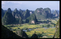 China, Guangxi, Guilin, Limestone peaks and surrounding landscape.