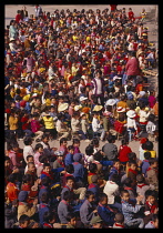 CHINA, Guizhou, School children gathered together in playground.