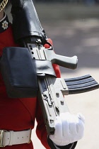 England, London, Queens Platinum Jubilee celebrations on the Mall, 02/06/2022, traditional Guardsman carrying modern assault weapon.