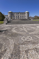 Ireland, County Wicklow, Enniskerry, Powerscourt Estate House and Gardens, Powerscourt House facade viewed from the balcony overlooking the Italian Garden.