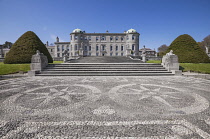 Ireland, County Wicklow, Enniskerry, Powerscourt Estate House and Gardens, Powerscourt House facade viewed from the balcony overlooking the Italian Garden.