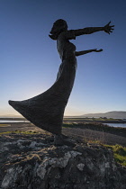 Ireland, County Sligo, Rosses Point, Waiting on the Shore sculpture by Niall Bruton unveiled in 2002.