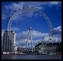 England, London, Millennium Wheel seen from the north bank of the river Thames.