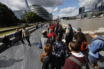 England, London, Mourners queueing along the banks of the river Thames to see the coffin of Queen Elizabeth II laying state in Westminster Hall.