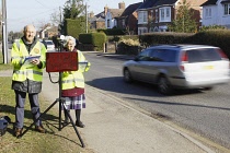 England, Kent, Transport, Commuinity Speed  Warden checking the speed of vehicles travelling though semi rural residential area.
