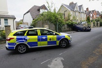 Transport, Road, Cars, Road Traffic Accident, Car overturned in urban street.