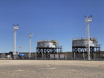 Argentina, Neuquen Province, Vaca Muerta, Oil and water storage tanks for onshore unconventional oil and gas production.