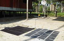 Colombia , Piraparana, Batteries being charged vis solar panels.