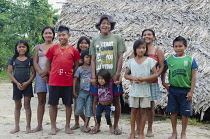 Piraparana, San Miguel, outside their traditional house, Tukano famility.