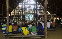 Colombia, Piraparana, Pidera Ni, Tukano indians watch the film Piraparana made about their ancestors in 1961 by Brian Moser.