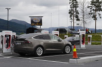 Norway, Tesla vehicle being recharged at a Tesla charging station.