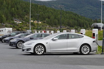 Norway-, Tesla vehicles being recharged at a Tesla charging station.