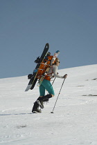 Norway-, Hemsedal, Back-country skier ascending Slettind mountain.