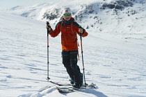 Norway-, Hemsedal, Back-country skier ascending Slettind mountain.