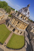 England, Oxfordshire, Oxford, Radcliffe Camera which is an iconic Oxford landmark and a working library, part of the central Bodleian Library complex, viewed here from the tower of the University Chur...