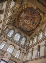 England, Oxfordshire, Woodstock, Blenheim Palace, The Great Hall featuring a painting from 1716 by Sir James Thornhill depicting the Duke of Marlborough kneeling to Britannia, proffering a plan of the...