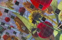 Netherlands, Rotterdam, The Markthal or Market Hall which is a residential and office building with a market hall underneath, Interior of the building with artwork by Arno Coenen and Iris Roskam, name...