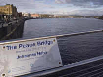 Ireland, North, Derry City, The Peace Bridge acrosss the River Foyle.