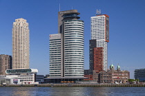 Holland, Rotterdam, The Nieuwe Maas River with the following buildings from left to right, the New Orleans Tower, the World Port Centre, the Montevideo Tower and Hotel New York which is situated in th...