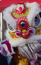 Portland Road, Dragon dance outside Asiana shop for Chinese New Year 2023, the year of the Rabbit.