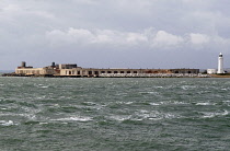 Fortification built on the end of Hurst Spit at the narrowest point of the Solent, opposite the Isle of Wight guarding the approaches to Southampton Port and Portsmouth harbour. First fort completed i...