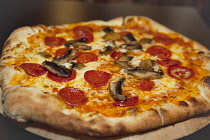 Food, Cooked, Pizza, Mushroom and Pepperoni Pizza in La Tavola Italian Eatery in Southwick, West Sussex, England.