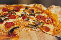 Food, Cooked, Pizza, Mushroom and Pepperoni Pizza in La Tavola Italian Eatery in Southwick, West Sussex, England.