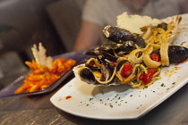 Food, Cooked, Seafood, Spaghetti Marinara, Pasta with Mussels and Calamari, La Tavola Italian Eatery, Southwick, West Sussex, England.