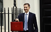 England, London, Westminster, Jeremy Hunt, Conservative Chancellor of the Exchequer, holding the red box in on Downing Street on budget day 15TH March 2023. BUDGET DAY, JEREMY HUNT MP, CHANCELLOR OF THE EXCHEQUER.