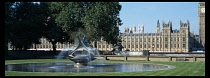 England, London, The Houses of Parliament and Big Ben seen from St Thomas Hospital with revolving fountain in the foreground.