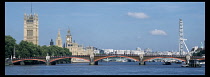 England, London, View along the River Thames towards Lambeth Bridge and Westminster and the London Eye  also known as the Millennium Wheel beyond.