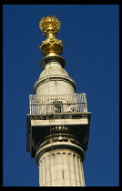 England, London, Column designed by Sir Christopher Wren to commemorate the Great Fire of London in 1666  62 metres or 205 feet high.  People on viewing platform.