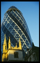 England, London, View of the Swiss Re Tower 30 St Mary Axe designed by Sir Norman Foster.