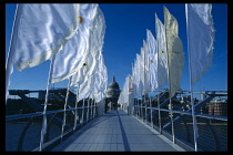 England, London,  Flags flying on either side of bridge view to St Pauls.