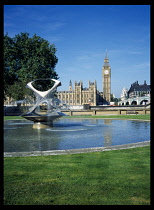 England, London, Westminster  The Houses of Parliament and Big Ben seen from St Thomas Hospital with revolving fountain in the foreground.