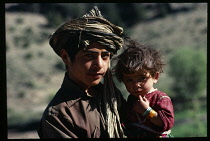 Afghanistan, General, Portrait of Pastun brother and sister.