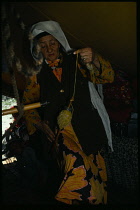 Afghanistan, General, Kirghiz woman inside tent spinning wool.