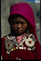 Afghanistan, General, Portrait of Kirghiz girl in traditional dress.
