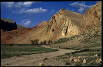 Afghanistan, Yakawlang District, General, Band i Amir to Bamiyan road through mountainous landscape with distant donkey rider.
